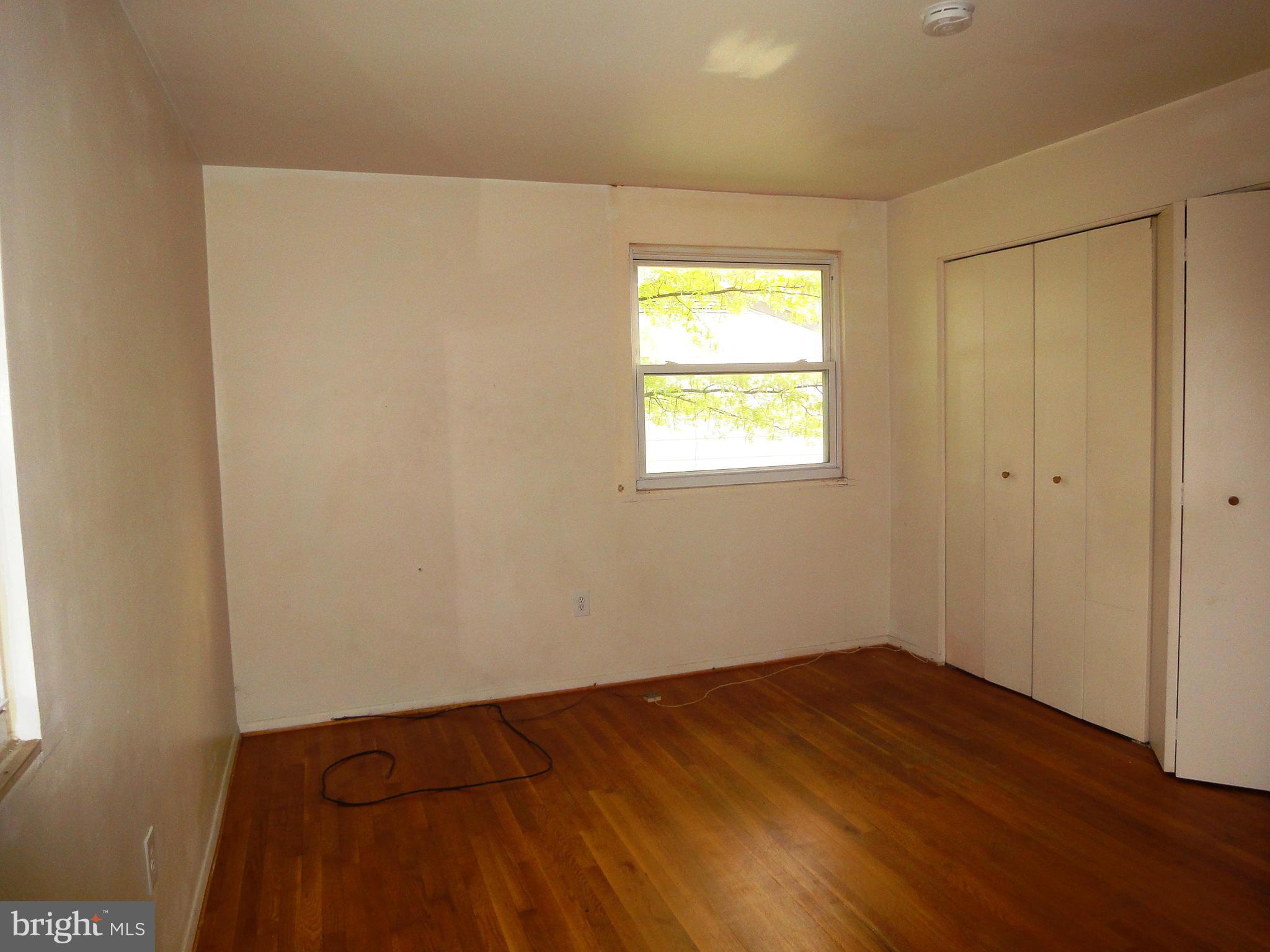 3905 Zurich Road Randallstown, MD 21133 - Photo 7 of 13 an empty room with a window