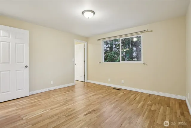 a view of livingroom with wooden floor