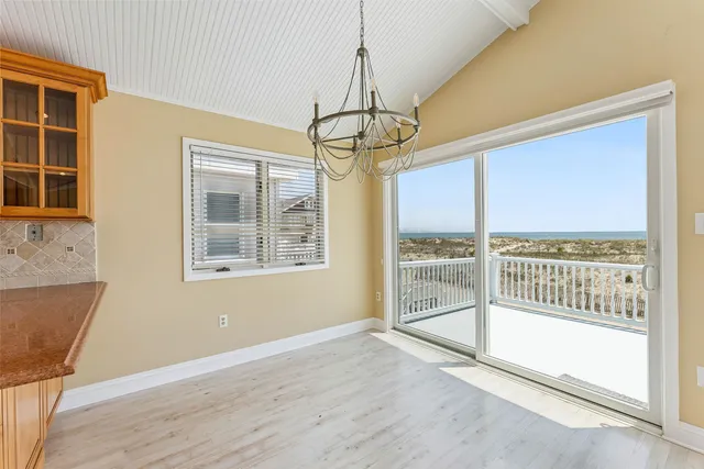 a kitchen with stainless steel appliances granite countertop a stove and refrigerator