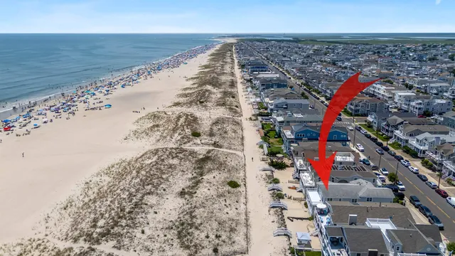 a kitchen with stainless steel appliances granite countertop a sink stove and microwave