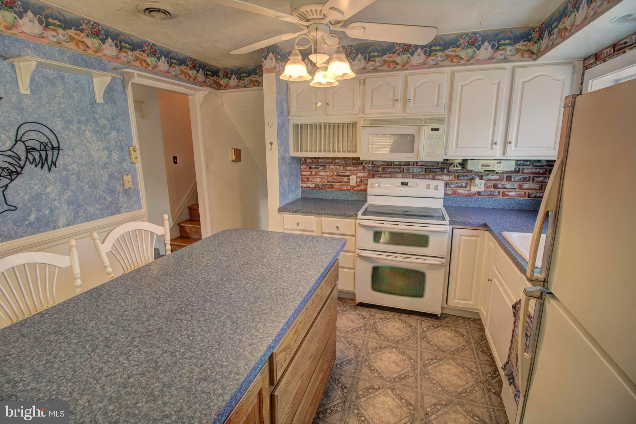 5805 Oakland Road Baltimore, MD 21227 - Photo 14 of 36 kitchen with island