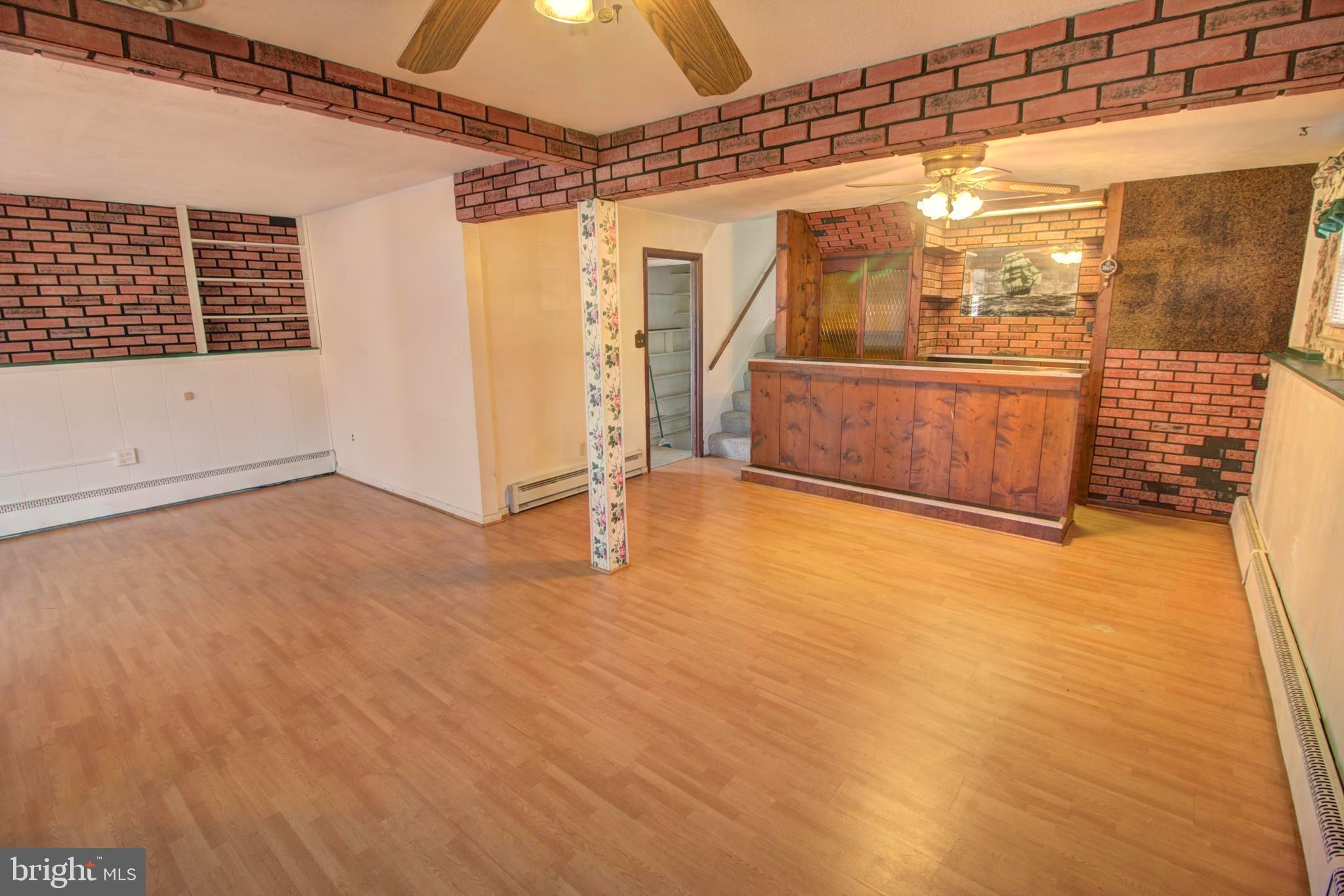 5805 Oakland Road Baltimore, MD 21227 - Photo 27 of 36 lower level with bar