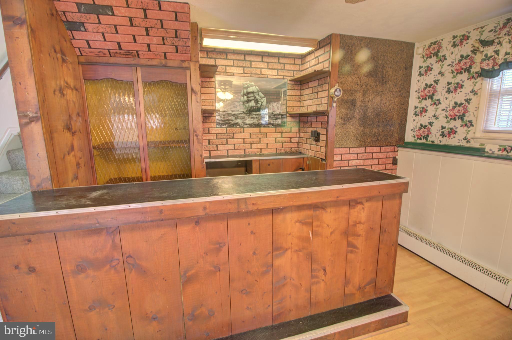 5805 Oakland Road Baltimore, MD 21227 - Photo 28 of 36 bar in lower level