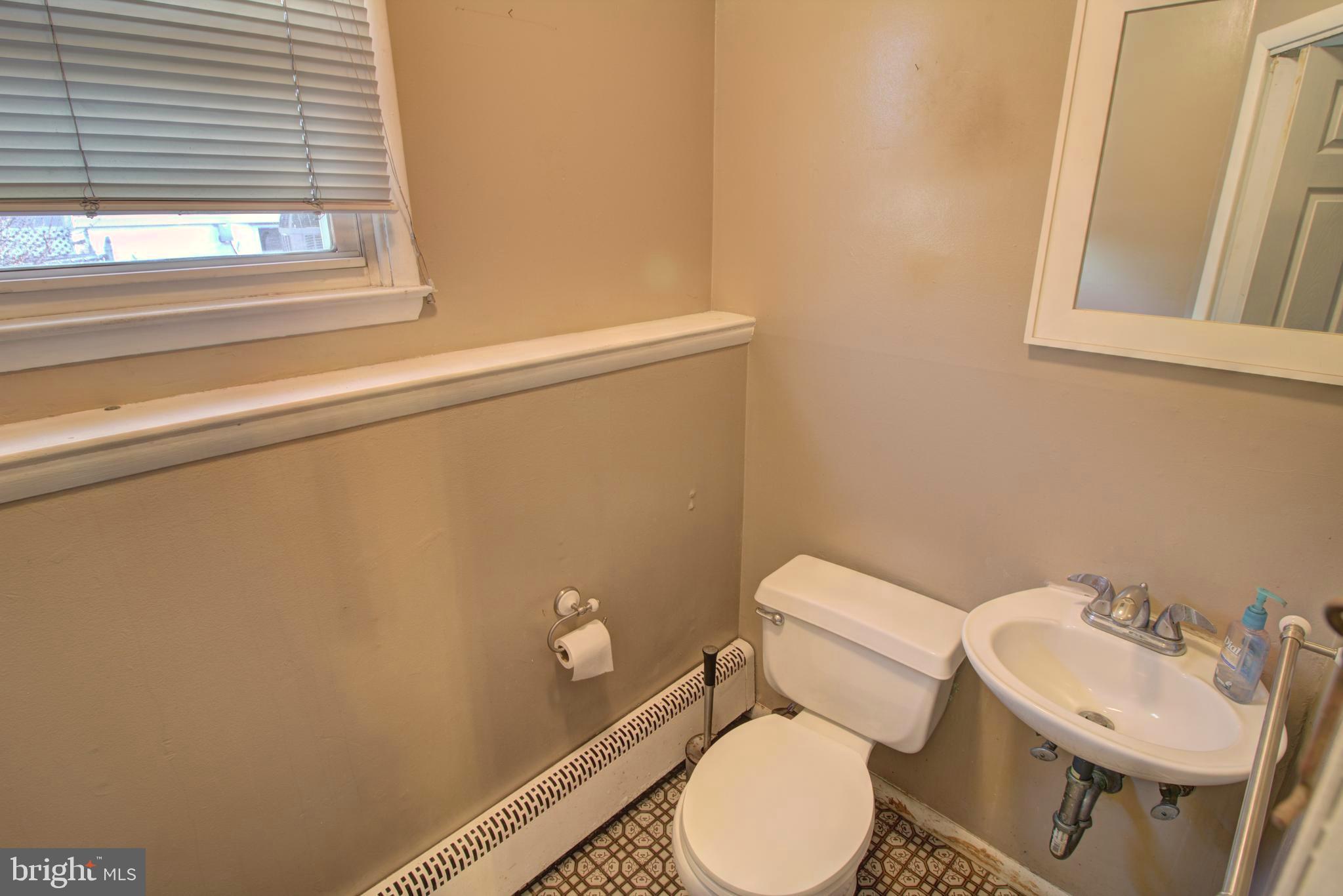 5805 Oakland Road Baltimore, MD 21227 - Photo 31 of 36 lower level half bathroom