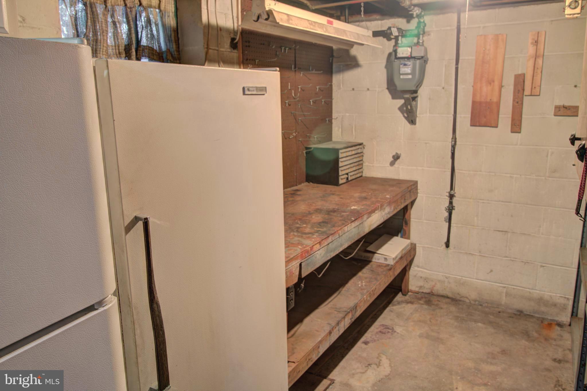 5805 Oakland Road Baltimore, MD 21227 - Photo 34 of 36 lower lever work shop