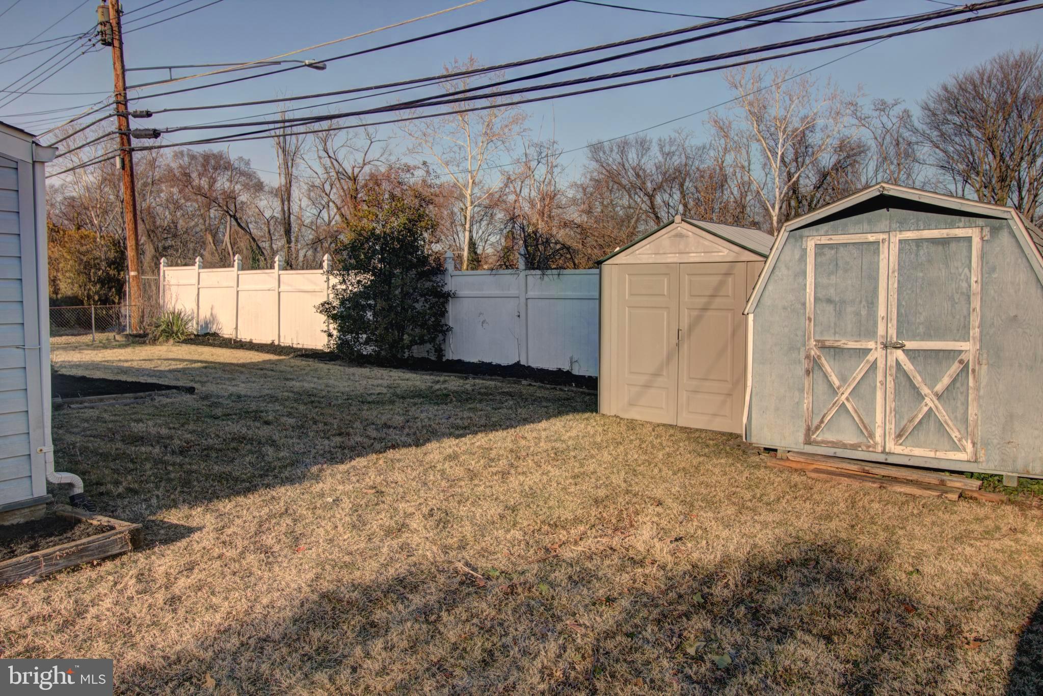 back yard with 2 sheds