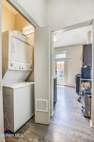 a view of hallway with washer and dryer