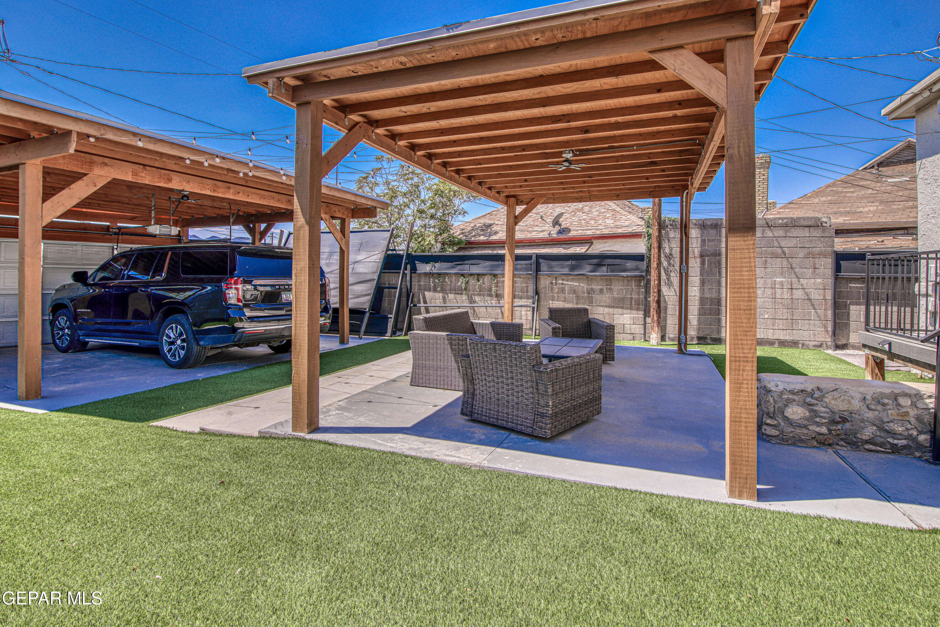 640 Stewart Court El Paso, TX 79902 - Photo 20 of 31 a building outdoor space with patio furniture and potted plants