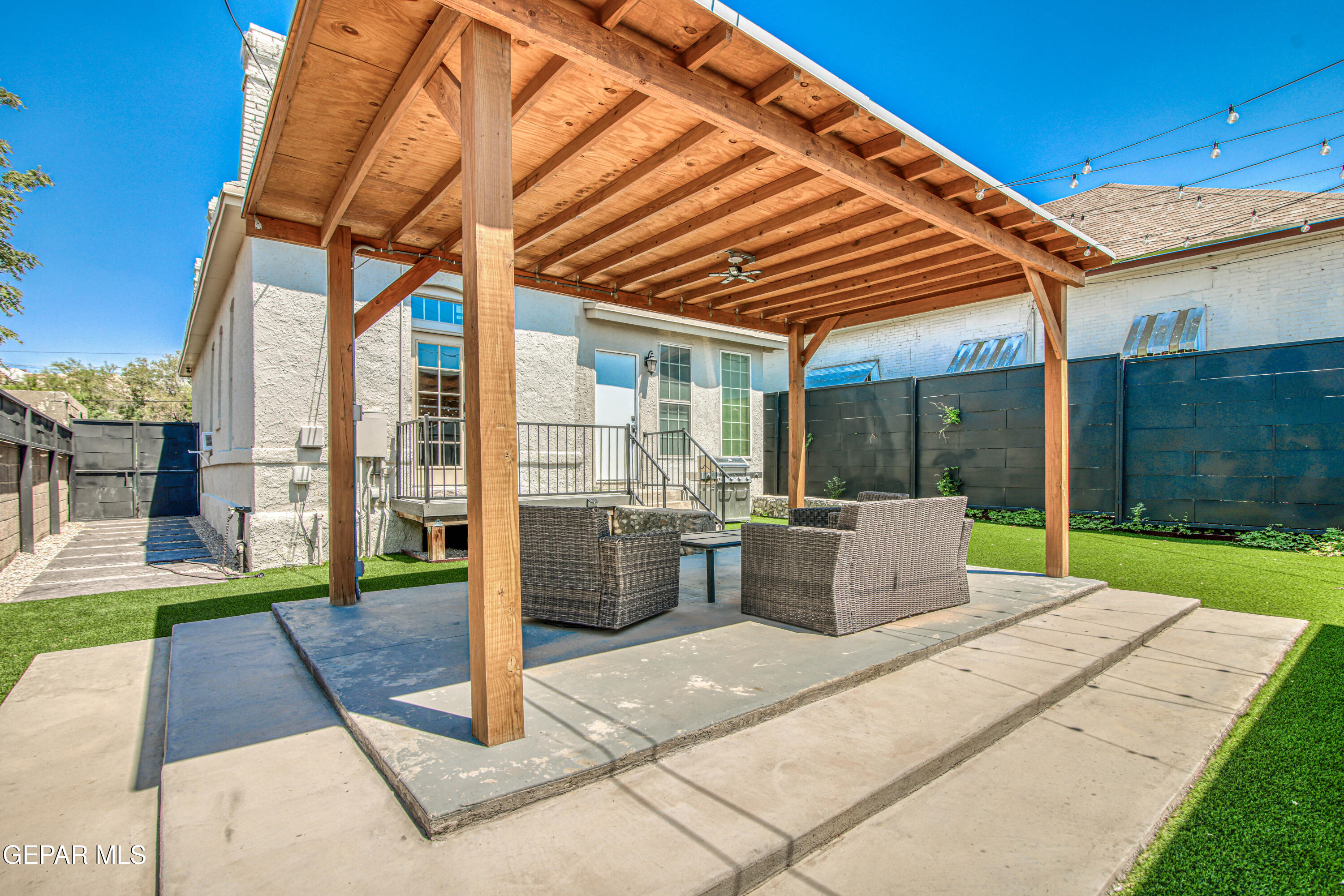640 Stewart Court El Paso, TX 79902 - Photo 21 of 31 a patio view with a table and chairs