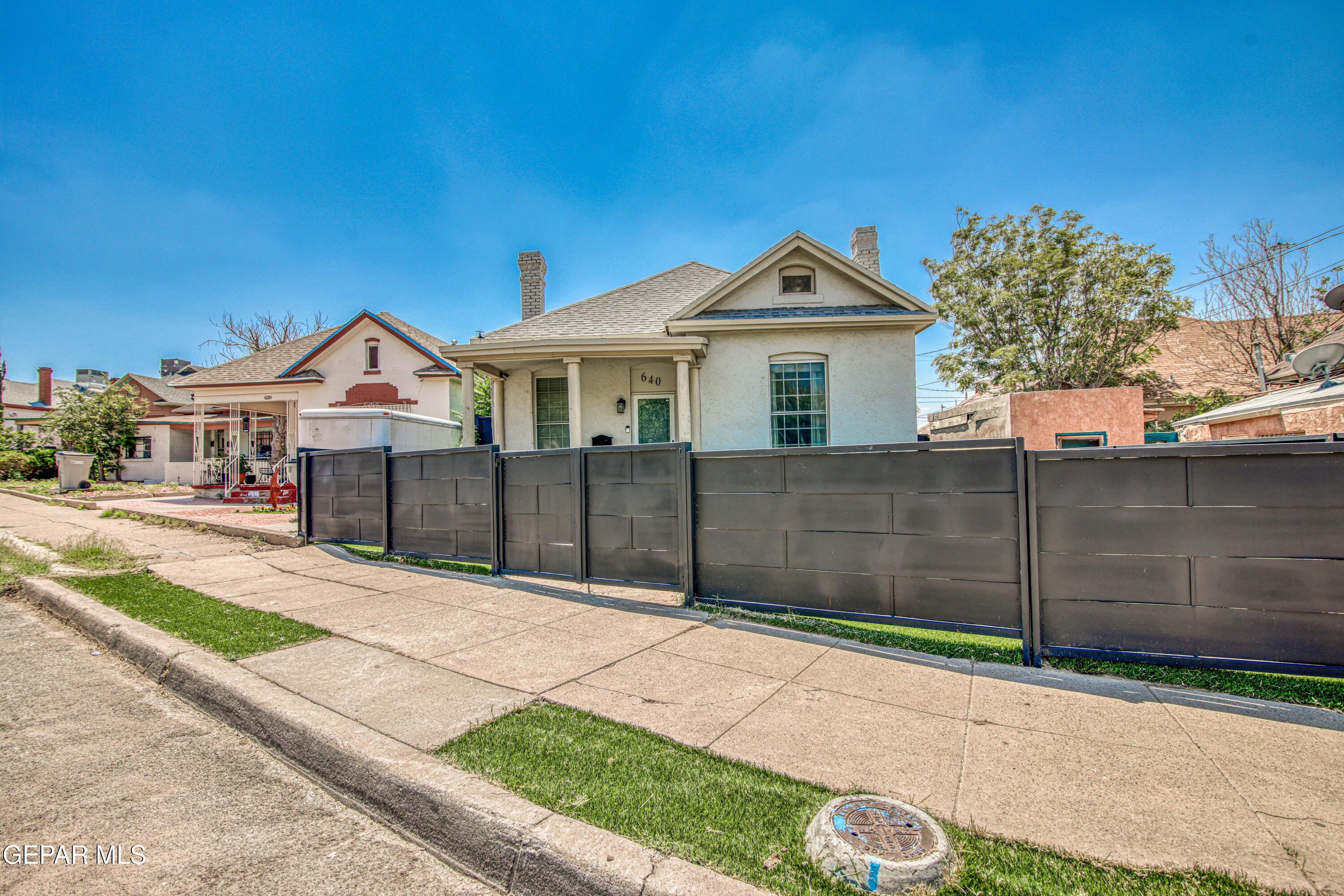 640 Stewart Court El Paso, TX 79902 - Photo 3 of 31 a front view of a house with a garage