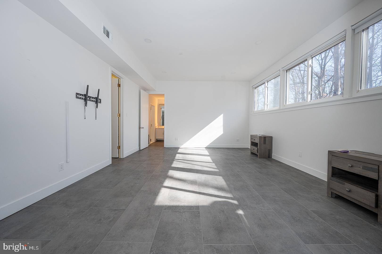 39-41 Fairview Road Penn Valley, PA 19072 - Photo 11 of 37 a view of a livingroom with wooden floor and furniture