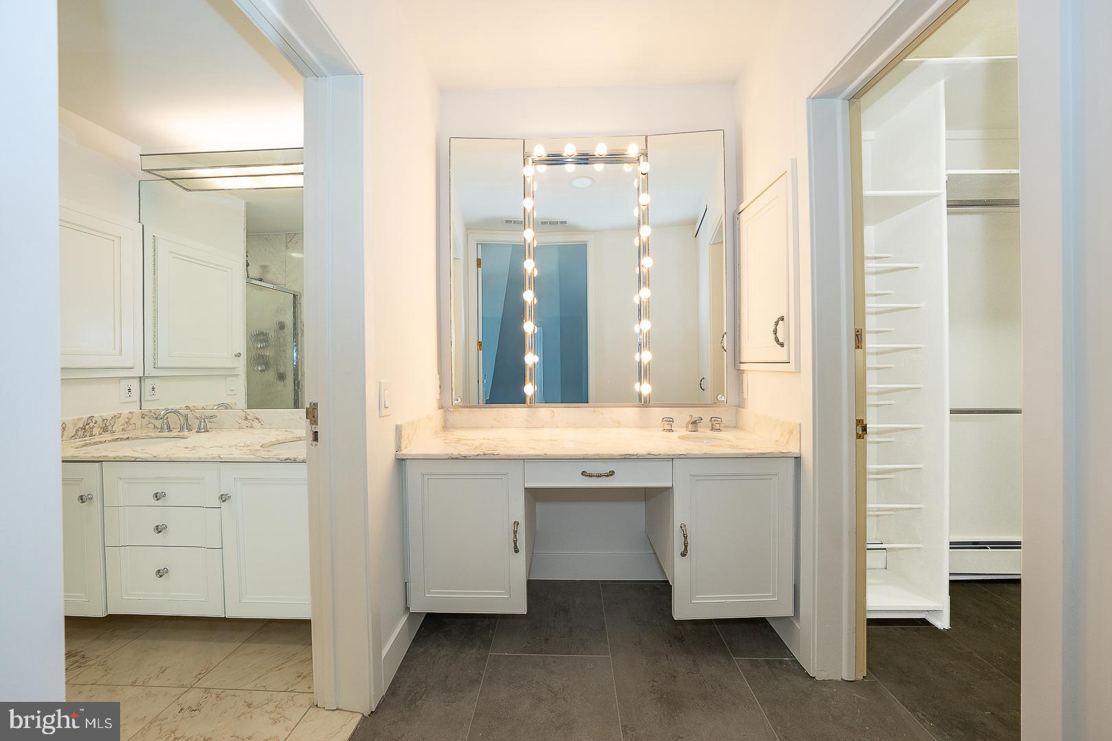 39-41 Fairview Road Penn Valley, PA 19072 - Photo 13 of 37 a bathroom with a granite countertop sink and a mirror