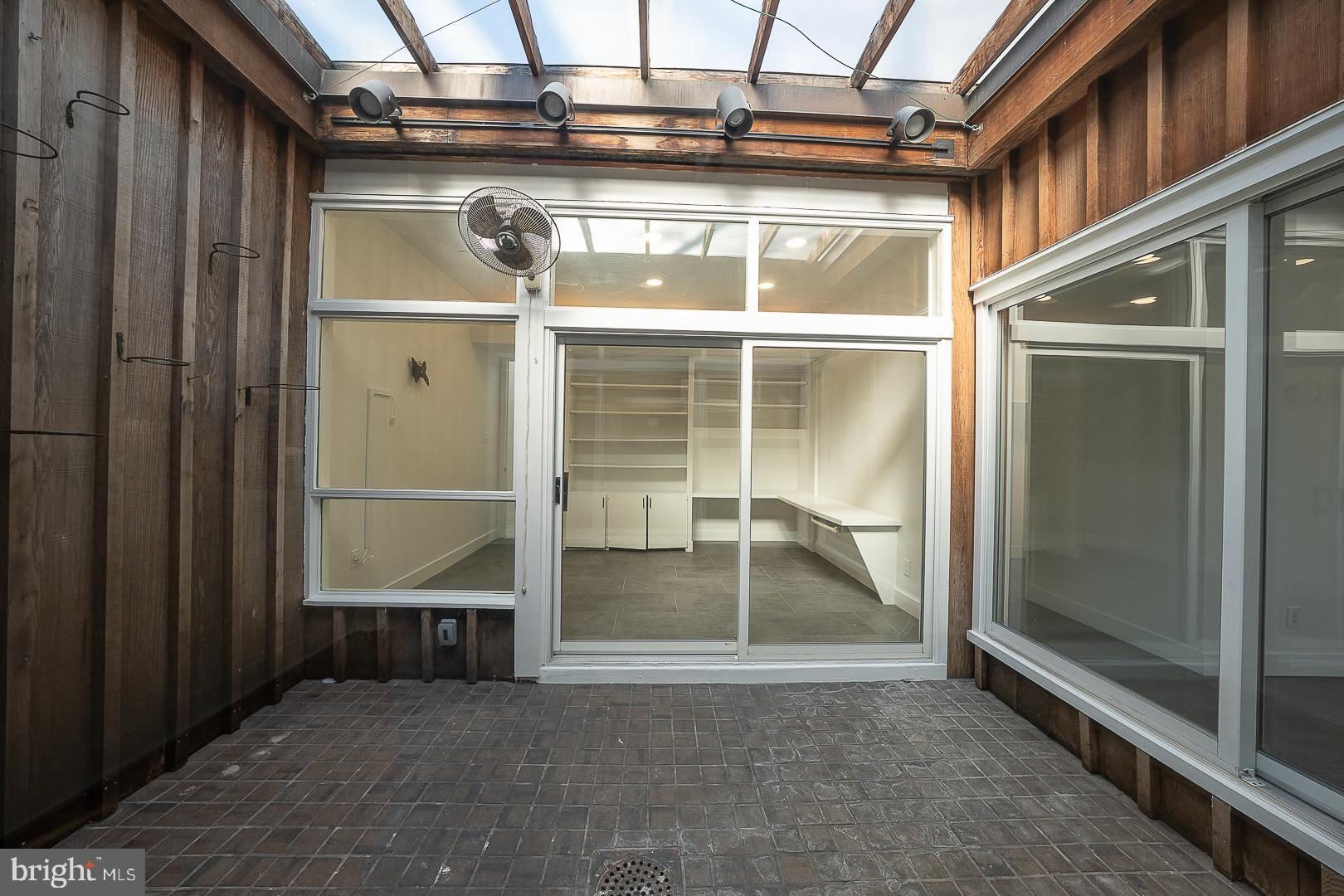 39-41 Fairview Road Penn Valley, PA 19072 - Photo 18 of 37 a view of an empty room with glass door