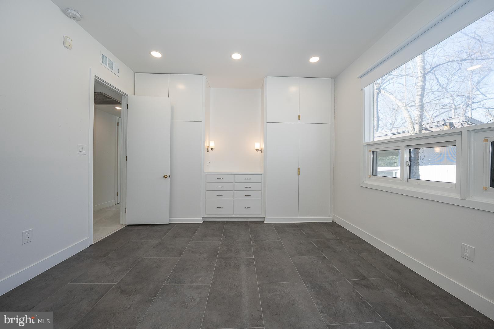 39-41 Fairview Road Penn Valley, PA 19072 - Photo 20 of 37 a view of an empty room with a window