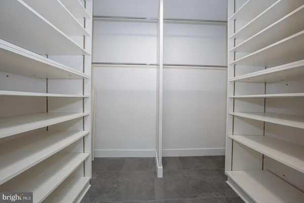 a view of an empty walk in closet