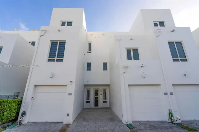 a view of a house with a street