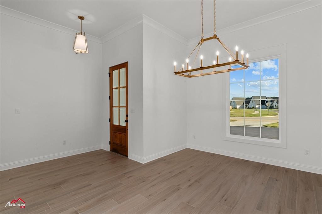 35 Turtle Creek Drive Benton, LA 71006 - Photo 17 of 32 a room with wooden floor and window