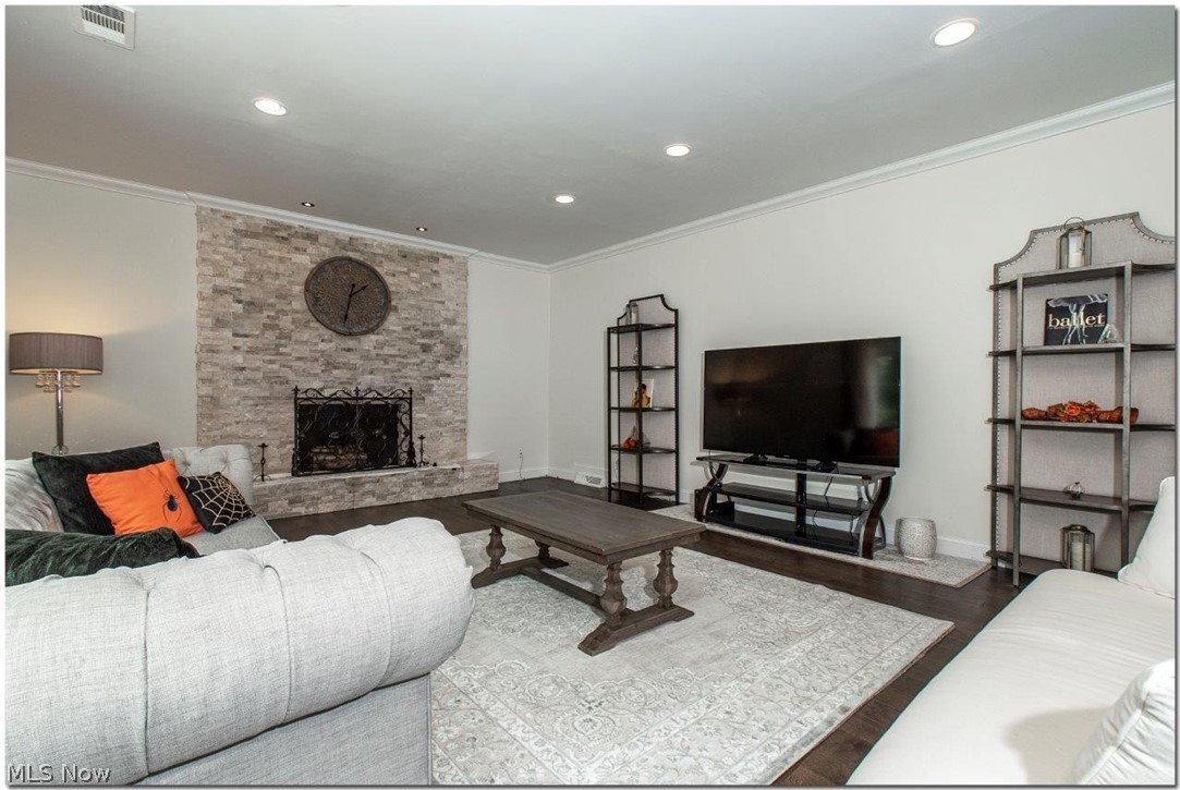 3200 Lander Road Pepper Pike, OH 44124 - Photo 14 of 35 Huge family room with a gorgeous stone fireplace with sliders to the patio