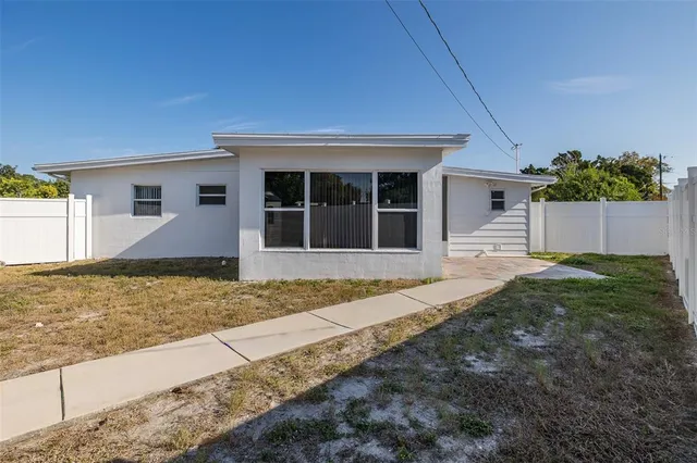 a view of a livingroom with wooden floor