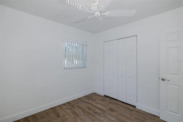 a view of a house with basketball court