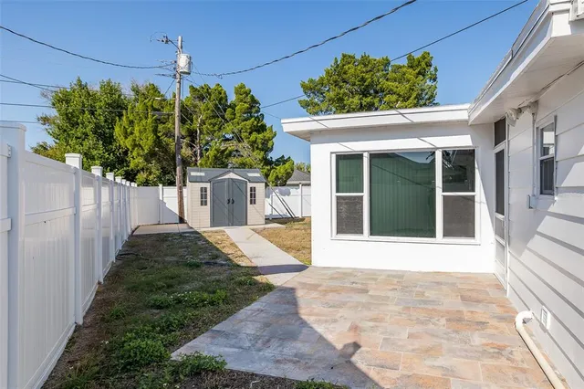 a view of backyard of house