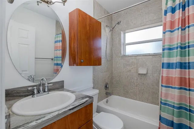 a view of a backyard of the house