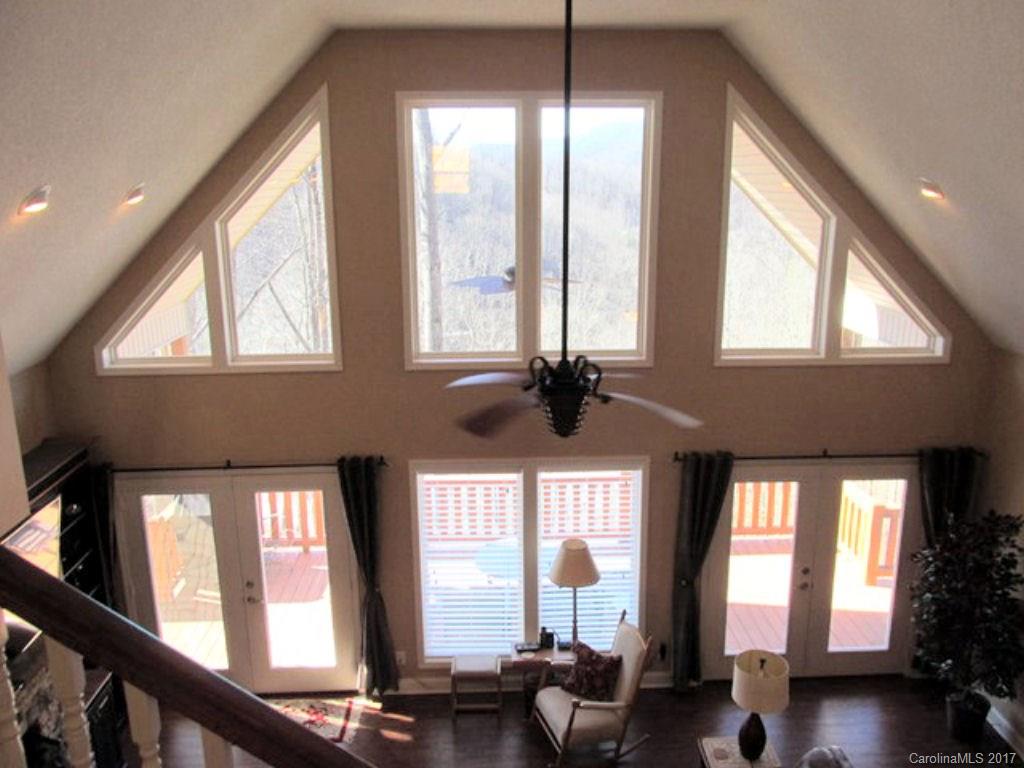 31 Lick Log Road Sylva, NC 28779 - Photo 4 of 24 a view of hall way with furniture and chandelier