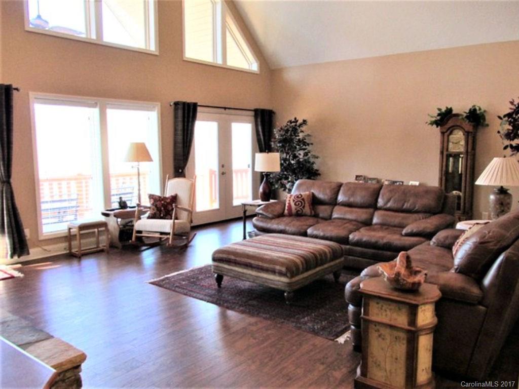 31 Lick Log Road Sylva, NC 28779 - Photo 6 of 24 a living room with furniture and a large window