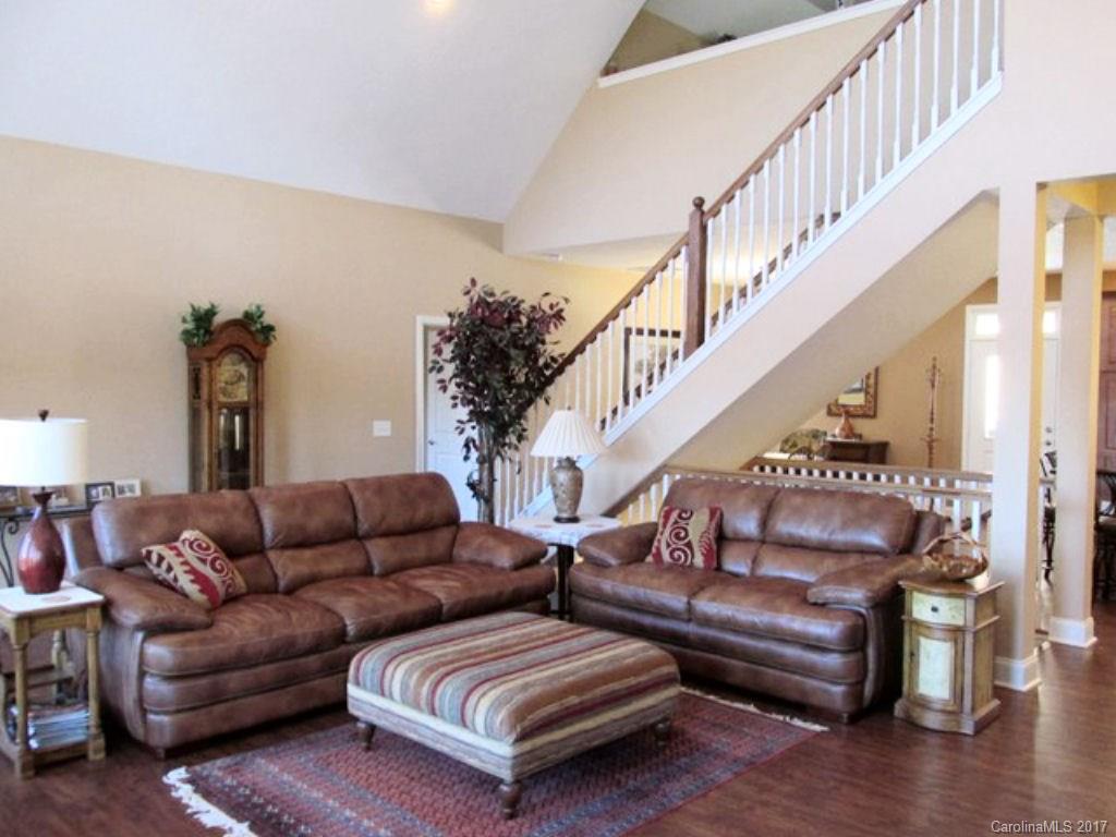 31 Lick Log Road Sylva, NC 28779 - Photo 7 of 24 a living room with furniture or stairs and a couch