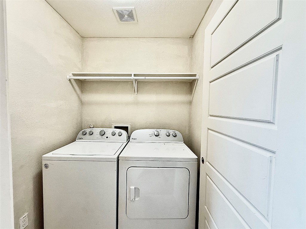 1900 Little Elm Trail, Unit 105 Cedar Park, TX 78613 - Photo 14 of 31 a utility room with dryer and washer