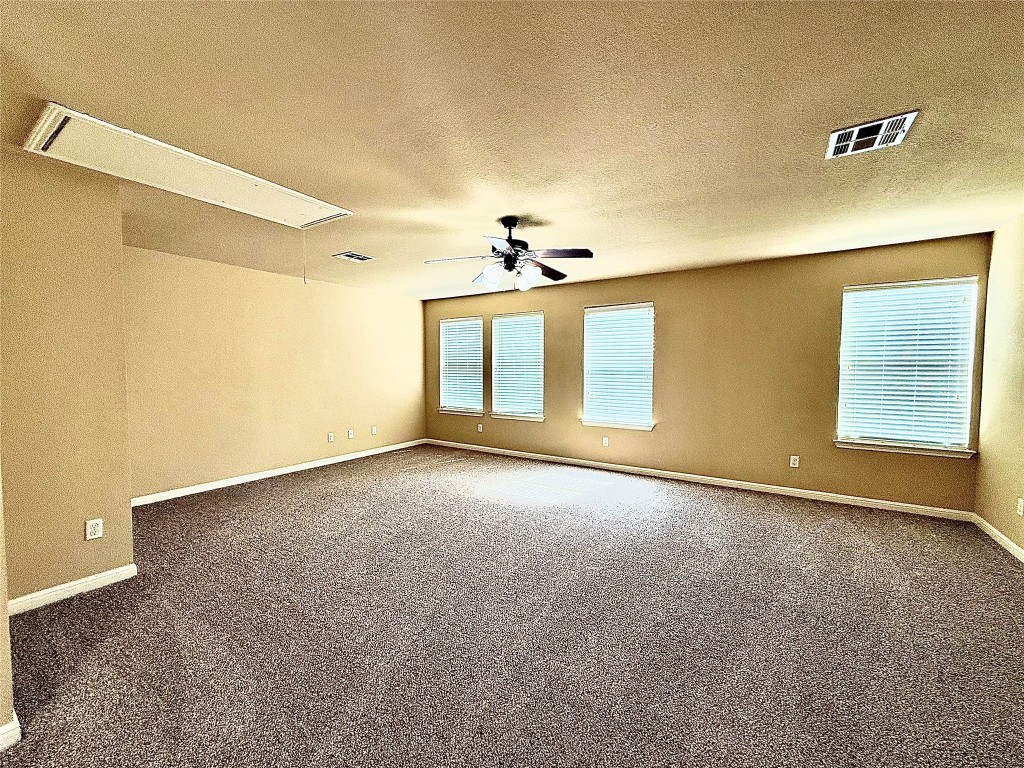 1900 Little Elm Trail, Unit 105 Cedar Park, TX 78613 - Photo 15 of 31 a view of an empty room with a window