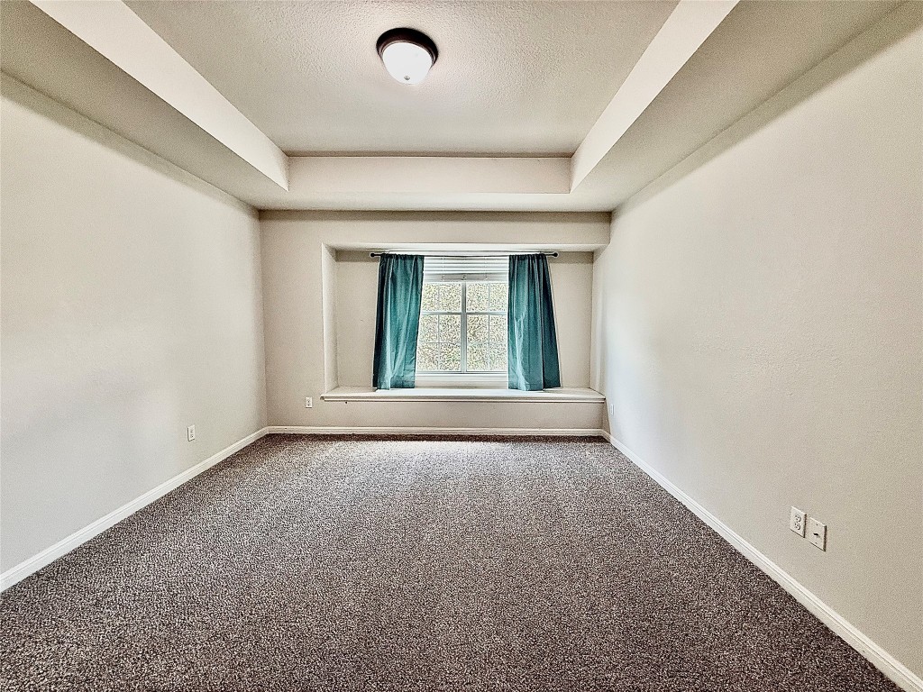 1900 Little Elm Trail, Unit 105 Cedar Park, TX 78613 - Photo 16 of 31 a view of an empty room with a window