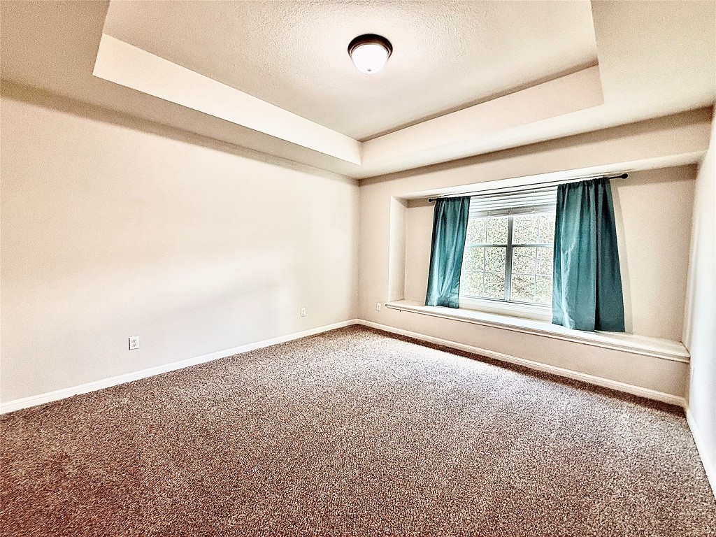 1900 Little Elm Trail, Unit 105 Cedar Park, TX 78613 - Photo 17 of 31 a view of an empty room with a window