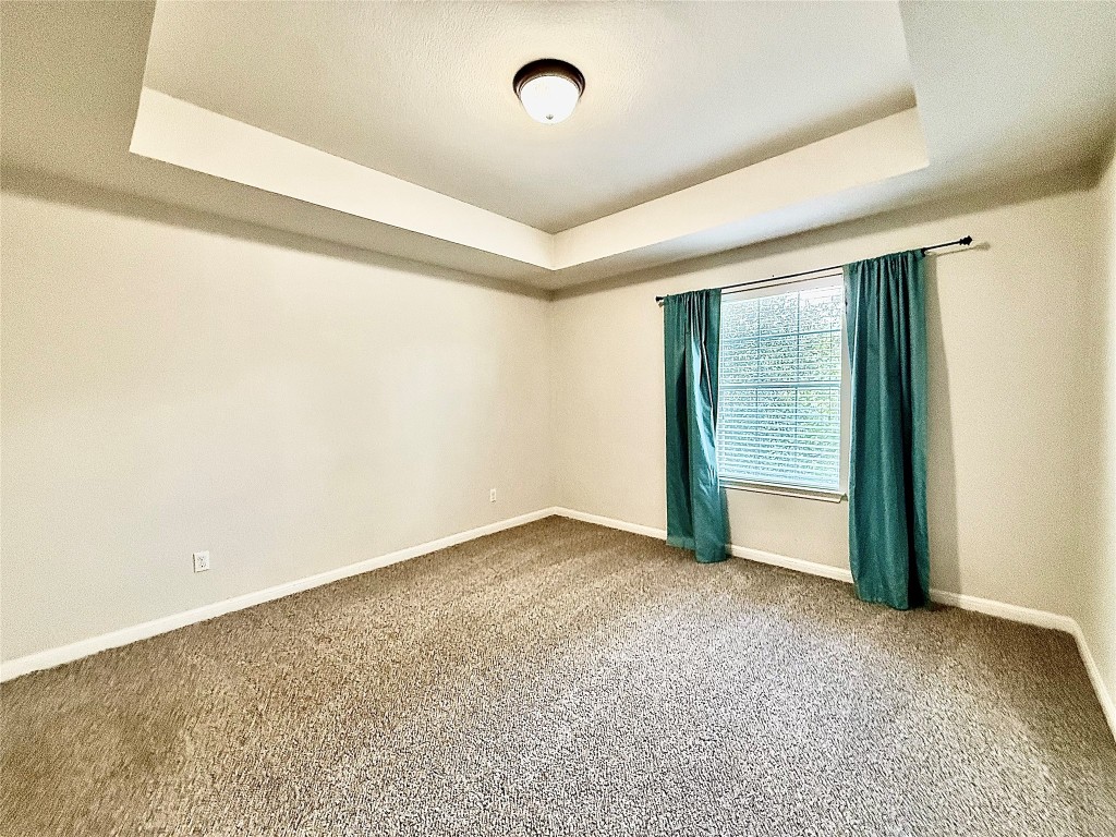 1900 Little Elm Trail, Unit 105 Cedar Park, TX 78613 - Photo 22 of 31 an empty room with sliding door