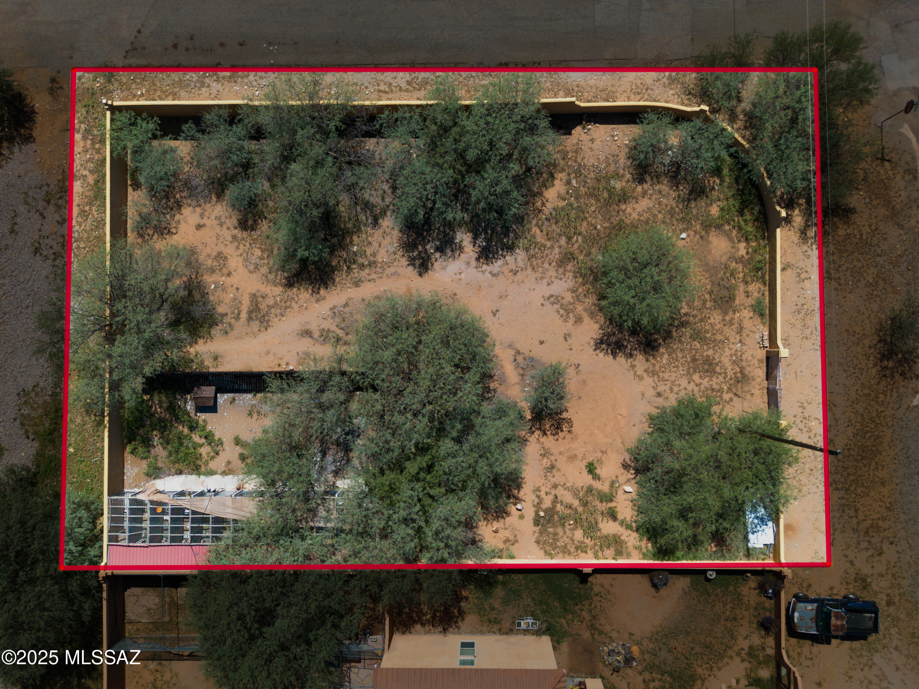 1910 Circulo Mexicali, Unit 173 Rio Rico, AZ 85648 - Photo 2 of 8 a view of a street with a tree