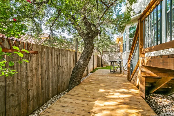 a view of a pathway of a house with a trees