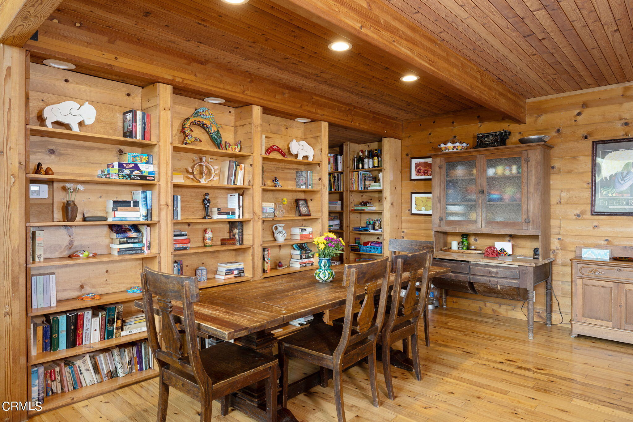 22 Santa Cruz Way Camarillo, CA 93010 - Photo 21 of 58 a dining room with a wooden table and chairs