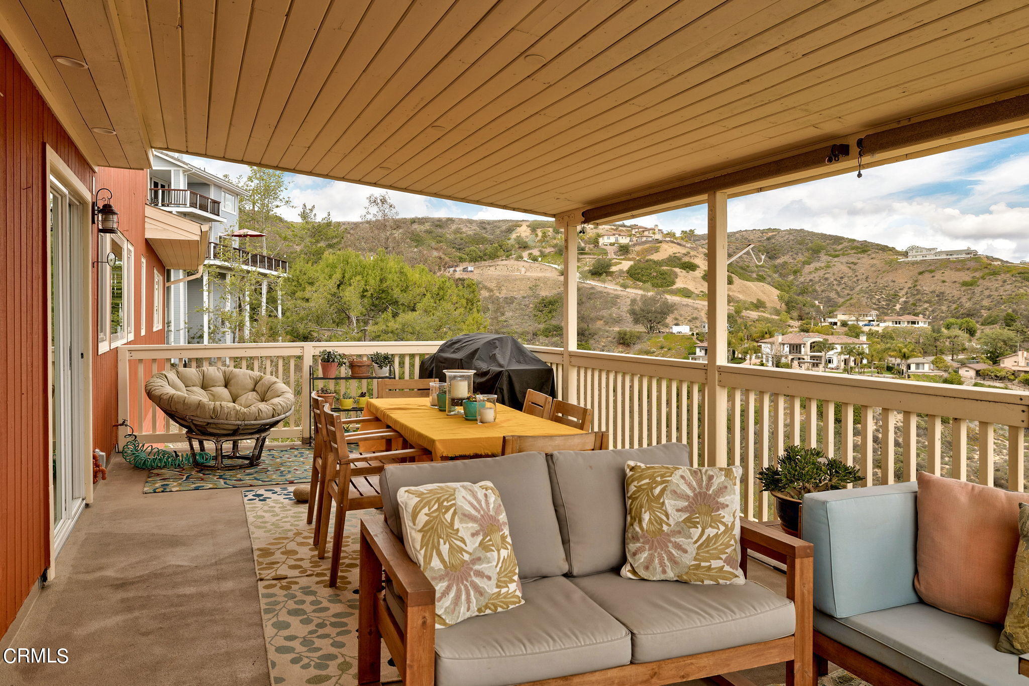 22 Santa Cruz Way Camarillo, CA 93010 - Photo 24 of 58 a roof deck with couches and wooden fence