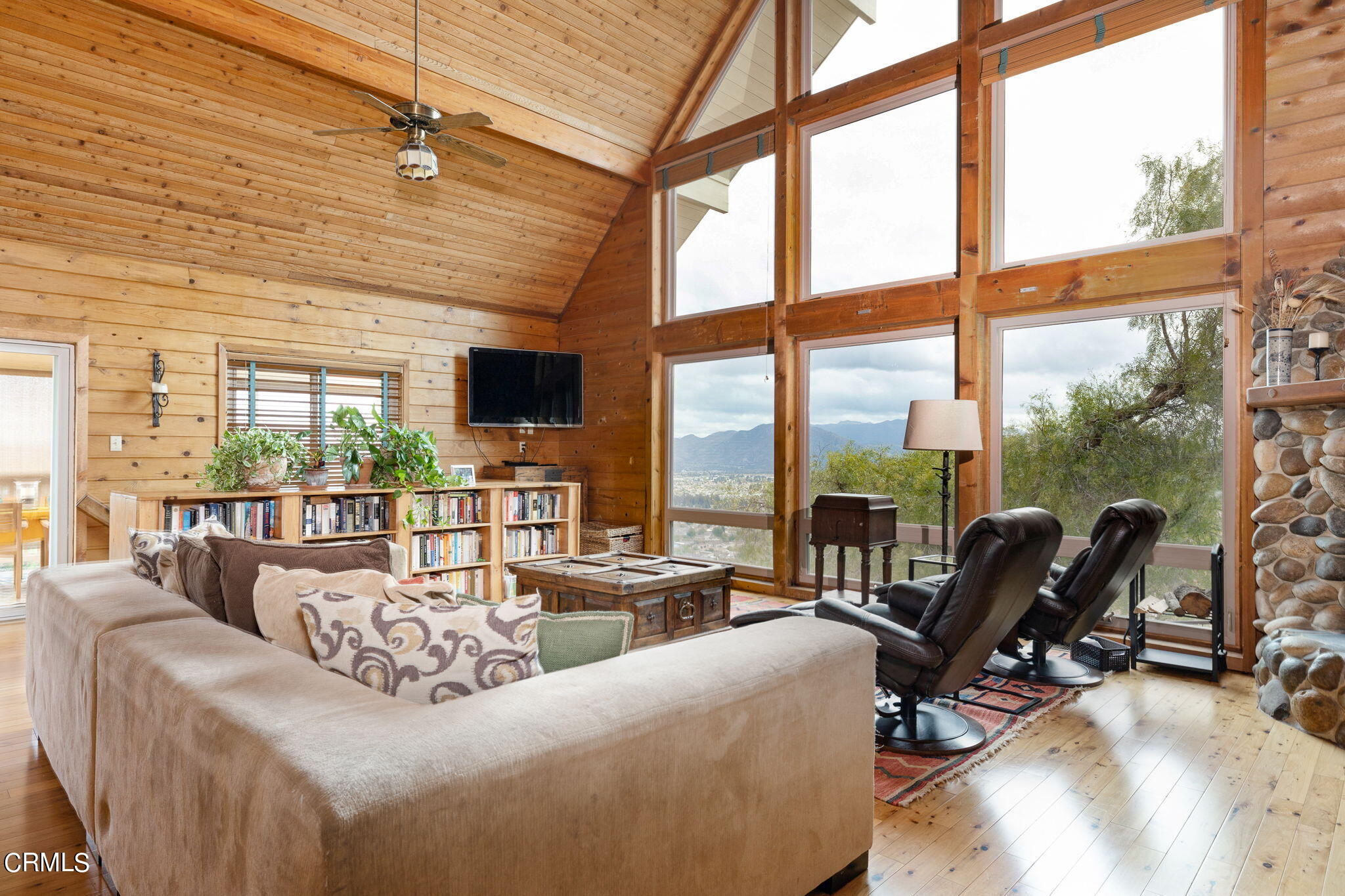 22 Santa Cruz Way Camarillo, CA 93010 - Photo 10 of 58 a living room with furniture and a floor to ceiling window