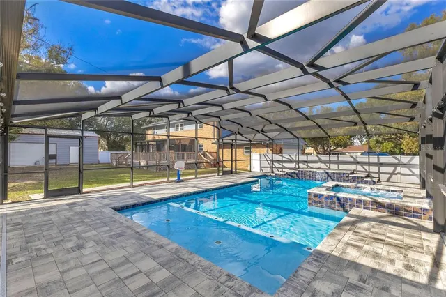 a view of a swimming pool with a outdoor space