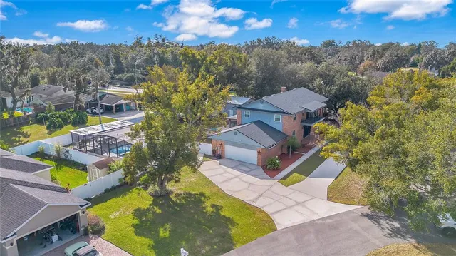 a room with furniture a flat screen tv and outdoor seating