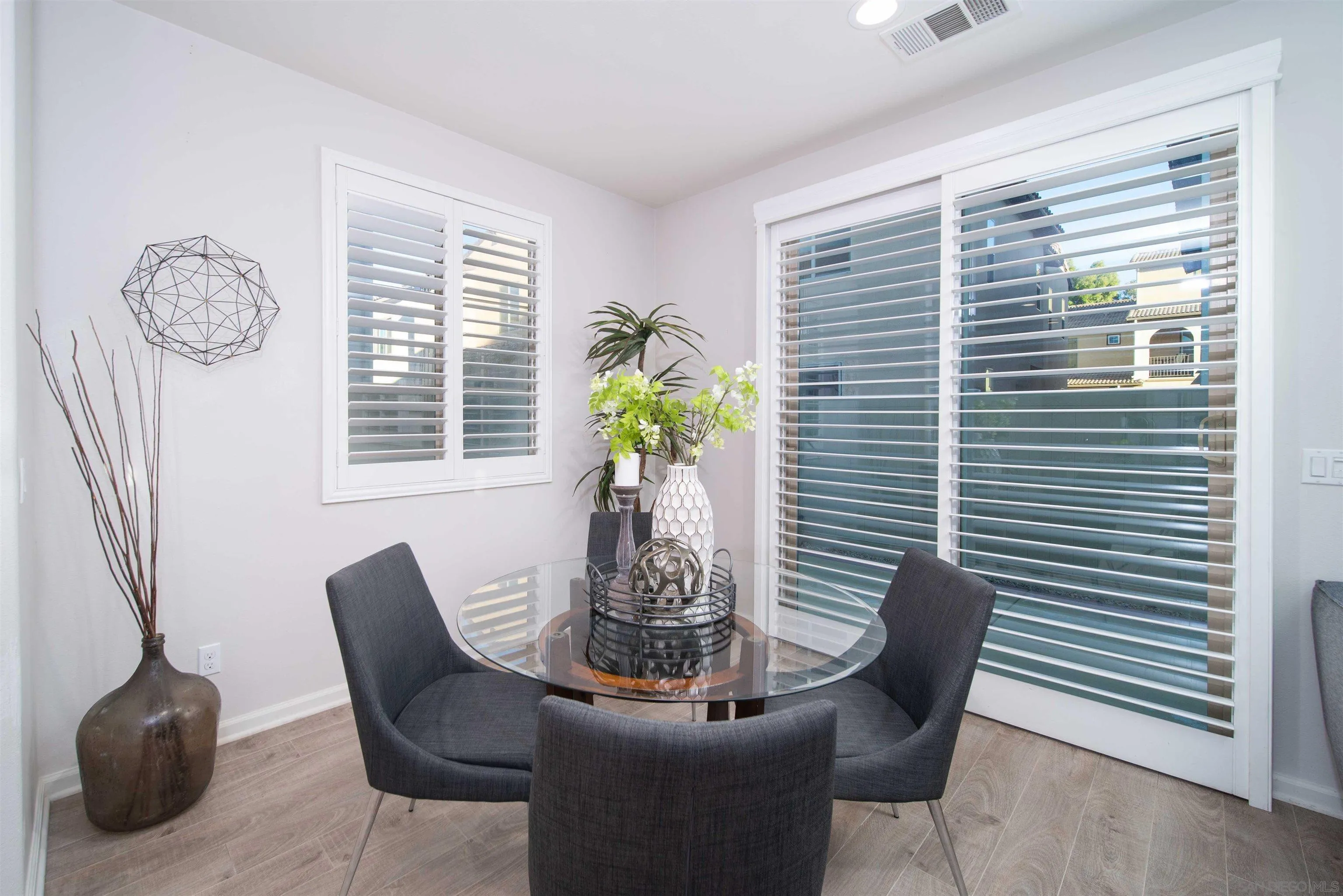 31556 Alicante Loop Winchester, CA 92596 - Photo 3 of 46 a dining room with furniture and windows