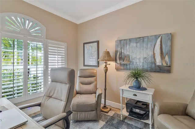 a bedroom with bed and window