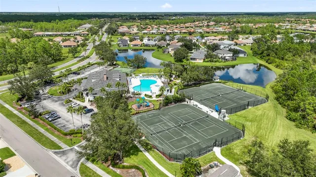 an aerial view of a house with a garden