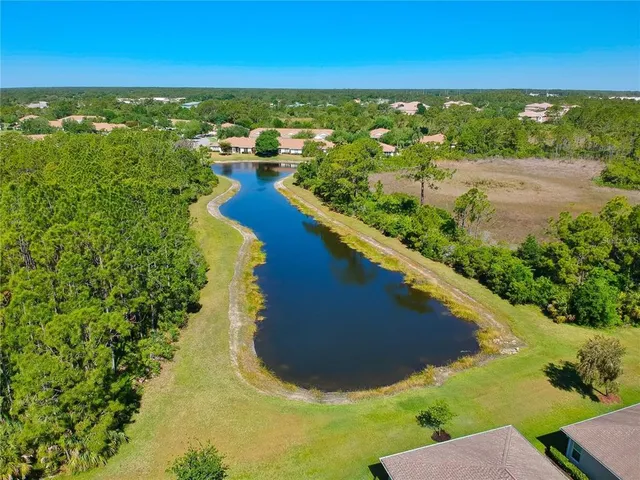 a view of a lake with a big yard