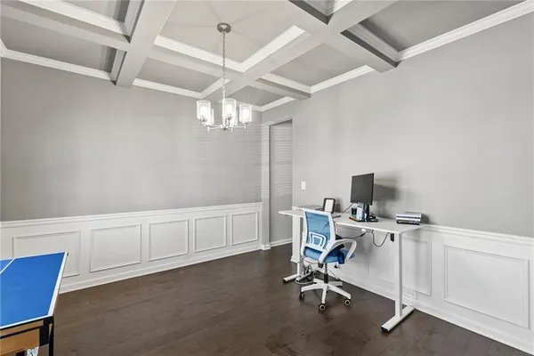 a view of a workspace with furniture