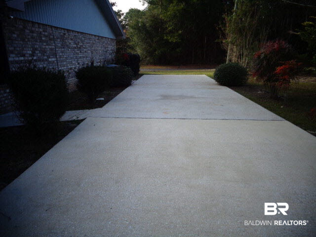 2804 Pine Ridge Drive Lillian, AL 36549 - Photo 34 of 39 Large motor home pad with hook-ups. Located on side of the home.