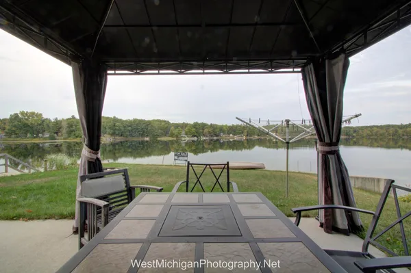 $279,900 | 21660 Brady Lake Boulevard, Morley, MI 49336