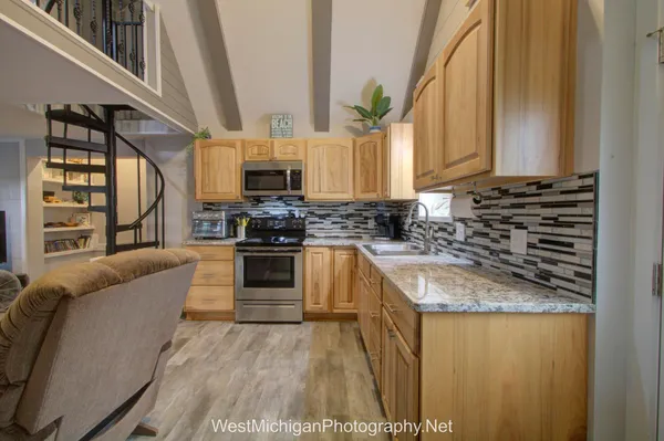 $279,900 | 21660 Brady Lake Boulevard, Morley, MI 49336