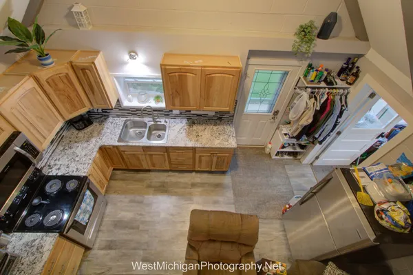 $279,900 | 21660 Brady Lake Boulevard, Morley, MI 49336